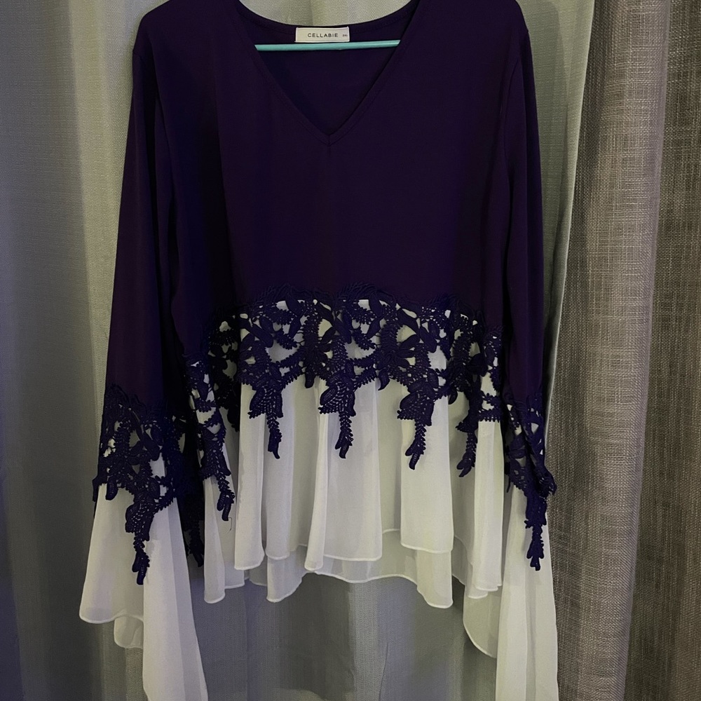 Unique sweater with lace and sheer detailing